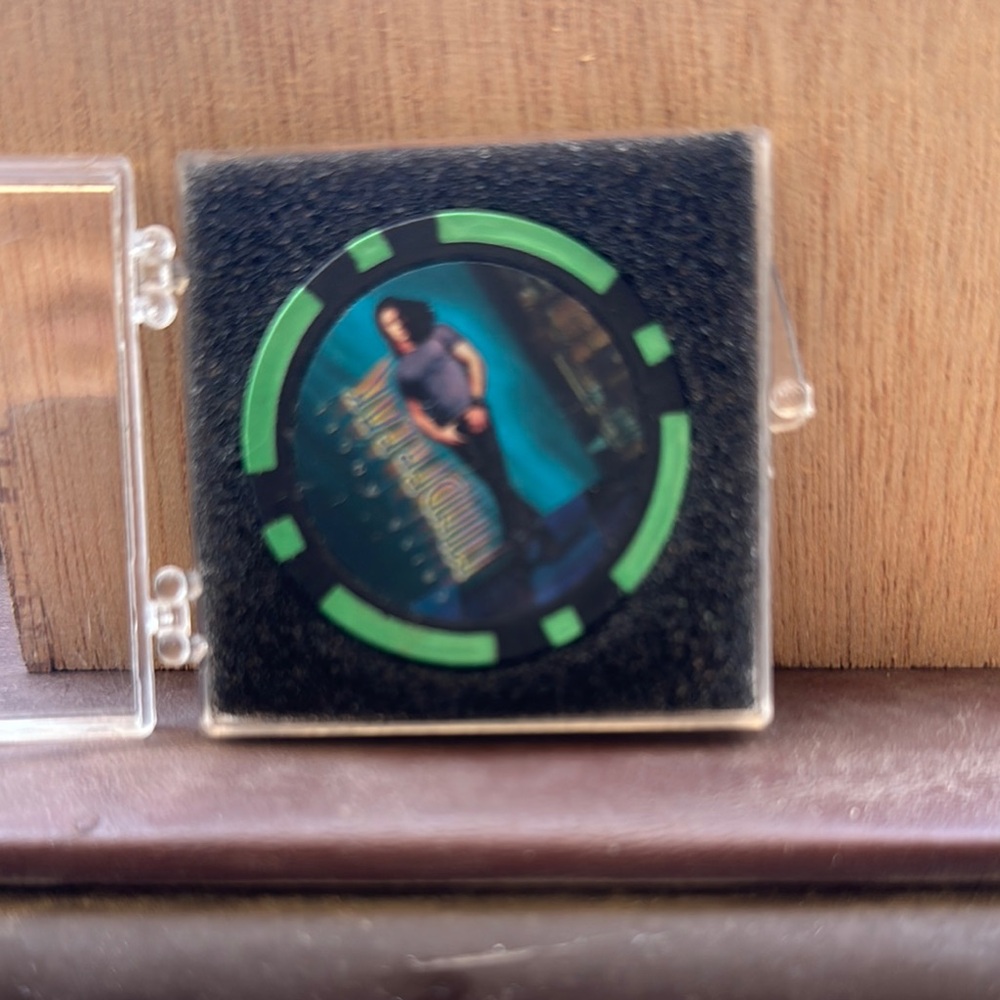 Green and Black Poker Chip